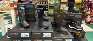 A display filled with our current in-store selection of Dryshod Boots!